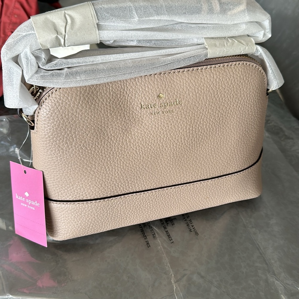 Brand New Kate Spade bag. Never unpackaged.